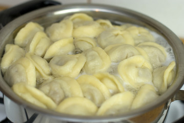 Russian pelmeni meal cooked in a pan