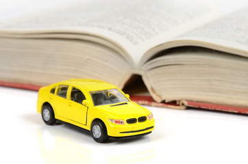 Toy car and dictionary