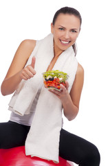 expressive positive woman with salad showing cool sign