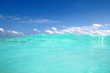 Fototapeta na wymiar blue turquoise wave caribbean sea water foam