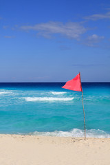 dangerous red flag in beach rough sea signal