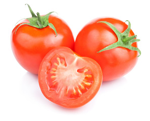Two Fresh Ripe Tomato and half isolated on White background