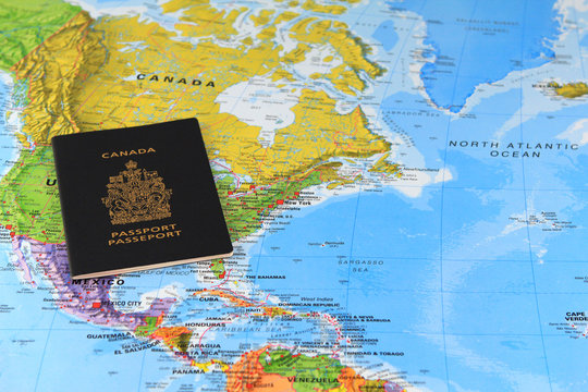 Canadian passport on the map of Canada