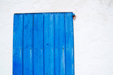 architecture balearic islands white blue doors detail