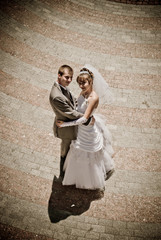 Obraz na płótnie Canvas bride and groom over wedding