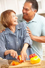 Senior couple cooking