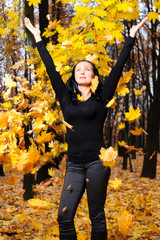 The women with the lifted hands autumn forest