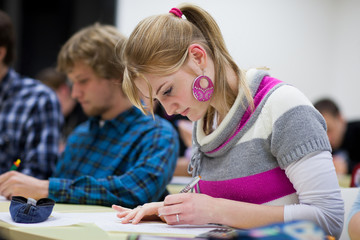 college student sitting in a classroom
