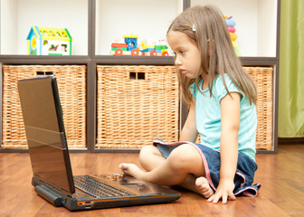 little girl with laptop © Eva Vargyasi