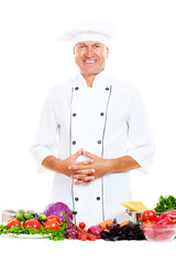 portrait of happy cook with vegetables