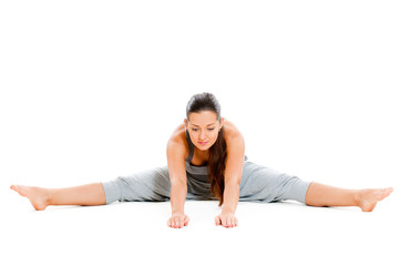 pretty woman doing flexibility exercise
