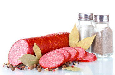 Tasty sausage and spices isolated on white