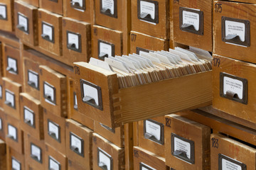 database concept. vintage cabinet. library card or file catalog.