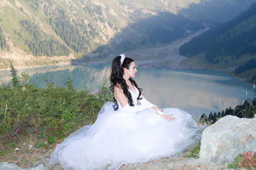 bride in a wedding dress on the nature