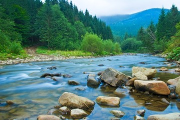 mountain river in a mist