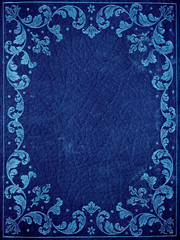 blue leather cover with floral decorations
