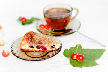 Herbal tea biscuit cake with cherries and raisins