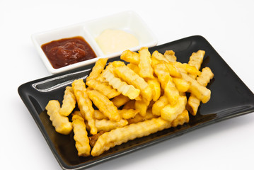 French fries in black plate