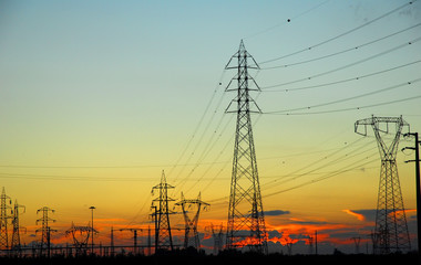 Fototapeta premium Ravenna, transmission lines at sunset.