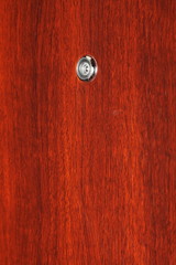 Peephole on wooden door