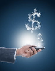 businessman holding mobile phone with dollars icon
