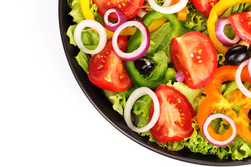 many vegetables in a pan isolated on white