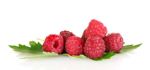 beautiful raspberries and leaves isolated on white