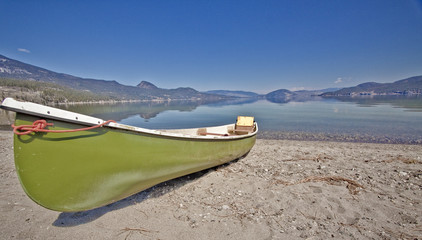 Canoe on the shores of a mountain lake