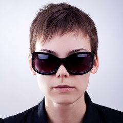 woman face in dark sunglasses