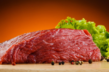 Raw beef on cutting board