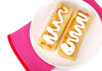 Rolled pancakes.