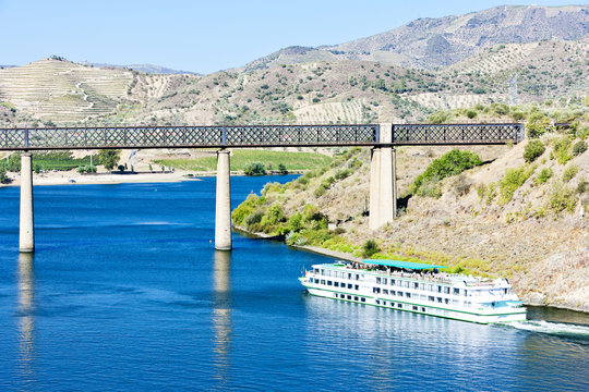 railway viaduct and cruise ship in Pocinho,Douro Valley,Portugal