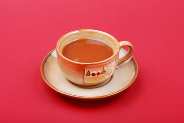 cup of coffee on red