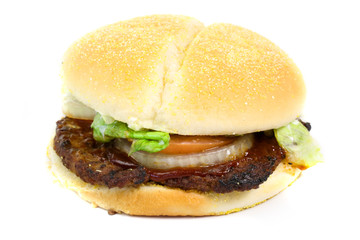 Hamburger with lettuce, tomato and onion isolated on white