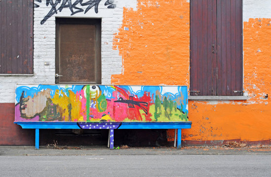 Colourfull graffiti bench and house, Antwerp