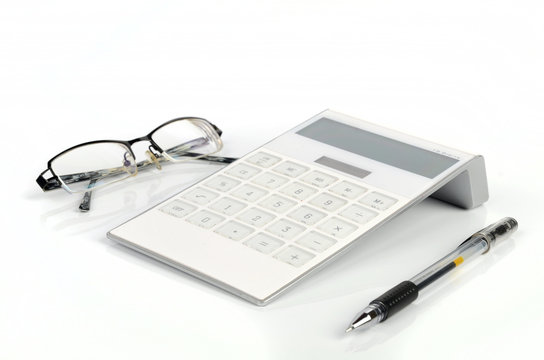 Calculator and pen with glasses