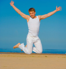 Fototapeta premium Athlete In Joy Jumping