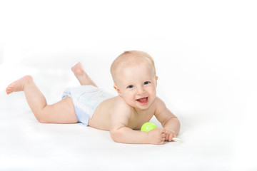 Baby of six month with toy on white background