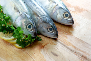 Raw Fish on Chopping Board