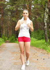 Young woman doing sport outdoors