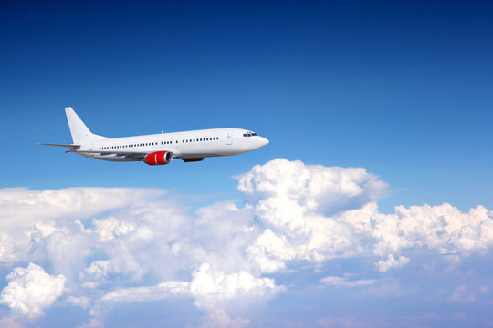 Jet plane above clouds