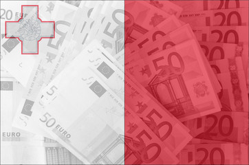 flag of Malta with transparent euro banknotes in background