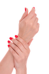 beautiful red manicure isolated on white
