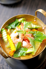 A bowl of seafood curry