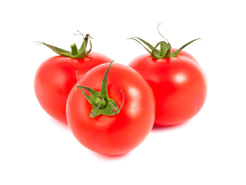 Three ripe red tomatoes