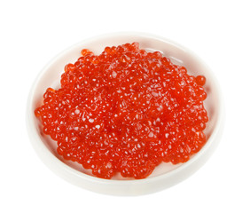 Red caviar on a white saucer