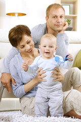 Obraz premium Happy Family with Baby