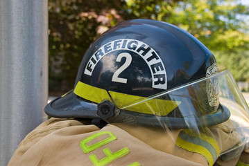 firefighter's helmet on coat