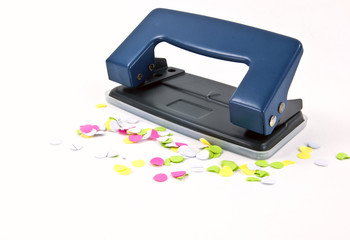 The office puncher with some confetti.