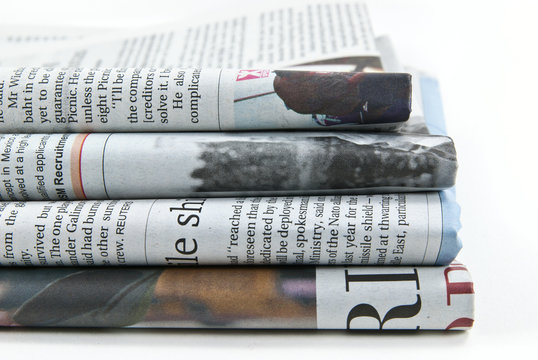 Close up of a pile of newspaper.